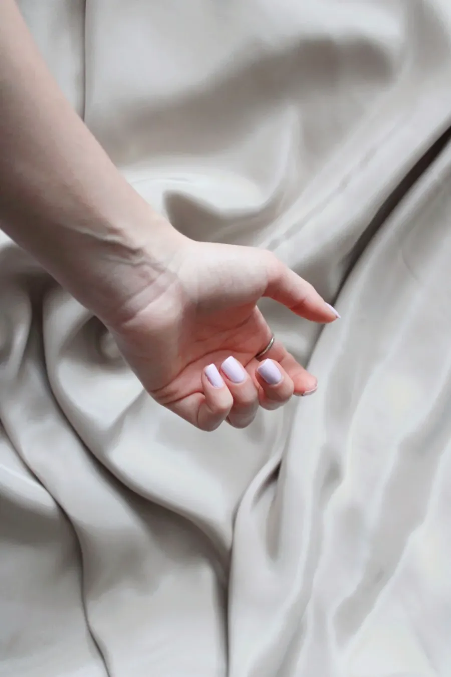 A fresh soft-lilac manicure finished by a Magic Nailspa artist