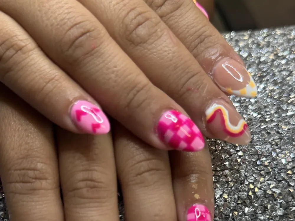 Almond set with hot-pink florals and a rainbow swirl accent