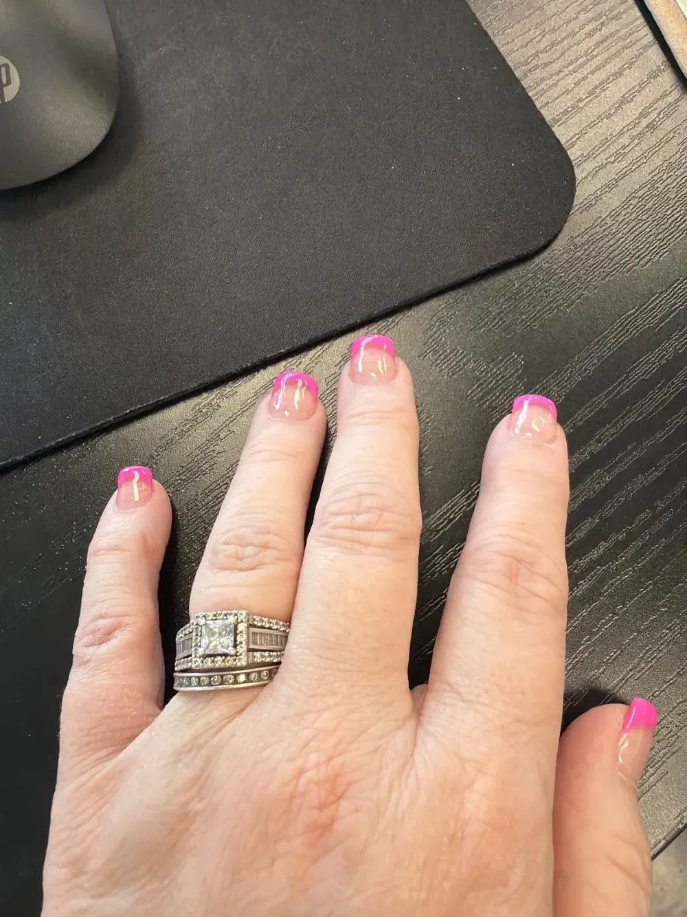 Hot pink French tips on natural nails